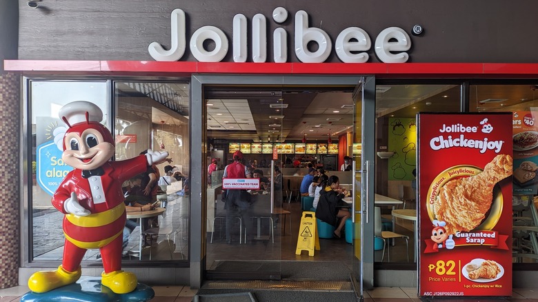 Jollibee outlet with large mascot outside