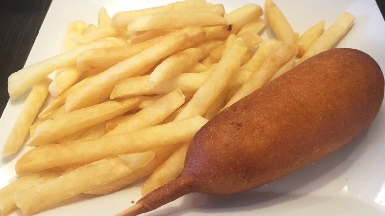 corn dog with side of fries