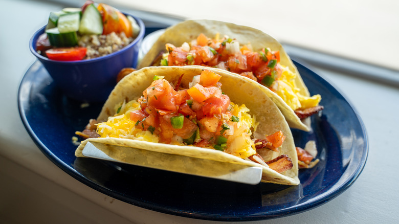 fast food tacos topped with salsa