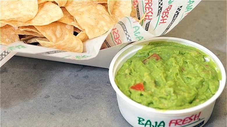 Chips with cup of guacamole