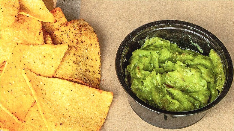 Chips and guacamole paper bag