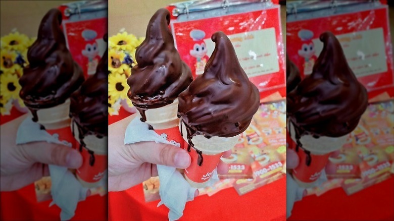 Jollibee's Chocolate Twirl dipped ice cream cone on a plate
