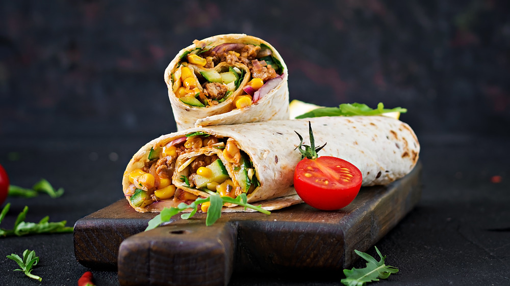 Burritos filled with different ingredients