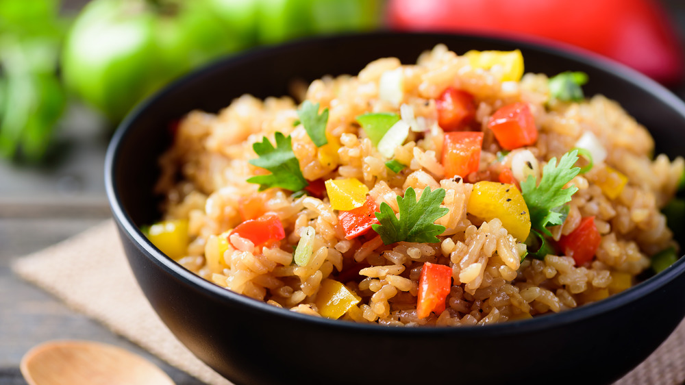 Black bowl of fried rice