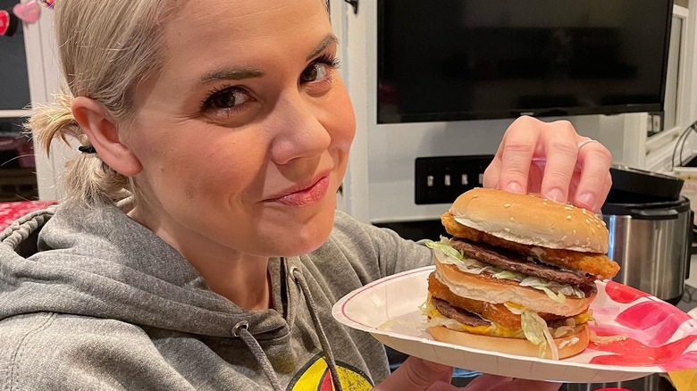 woman eating McDonald's burger