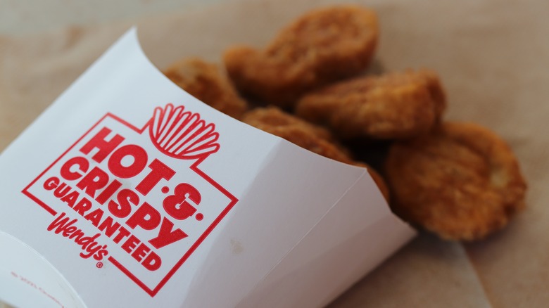 Wendy's nuggets pouring from container