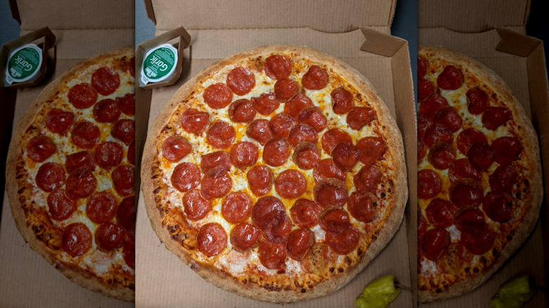 Pepperoni pizza in cardboard box