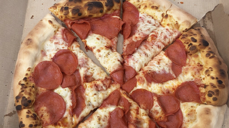 Chuck E. Cheese pepperoni pizza burned