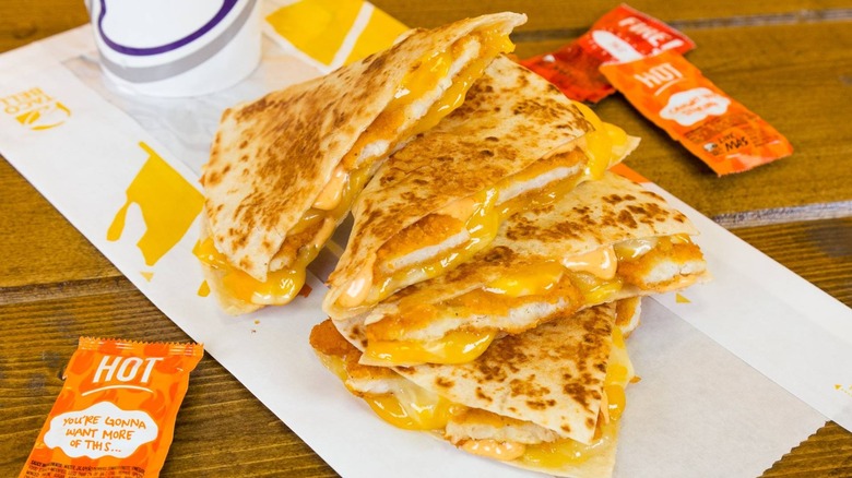 Taco bell quesadilla and hot sauce 