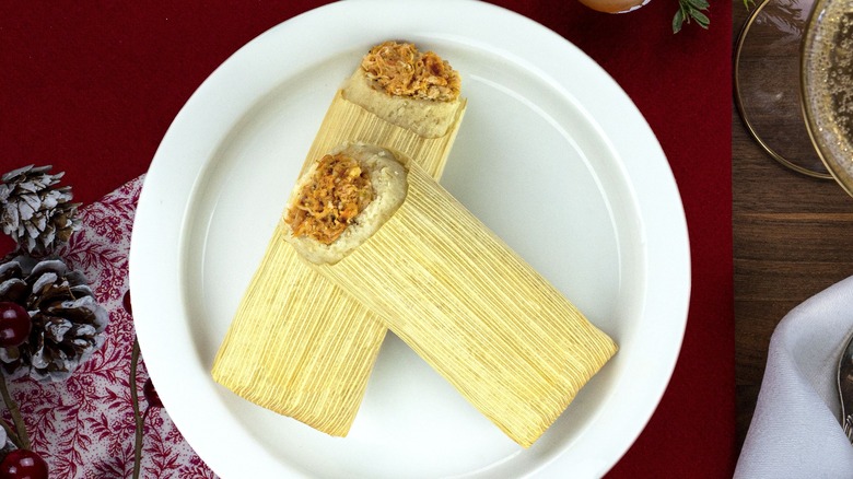 Two tamales on a plate