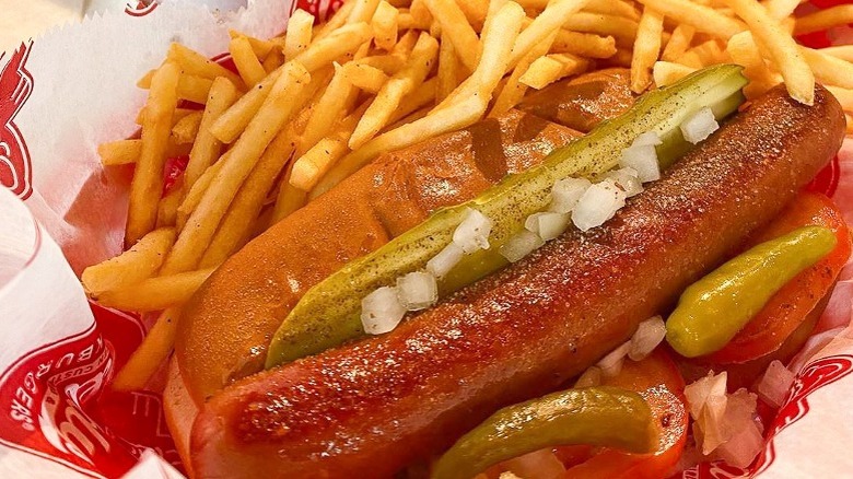 A Chicago dog with fries