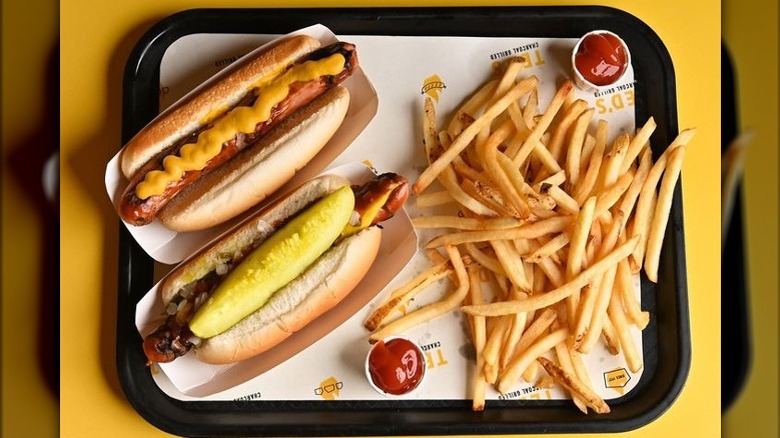 Tray of hot dogs, fries