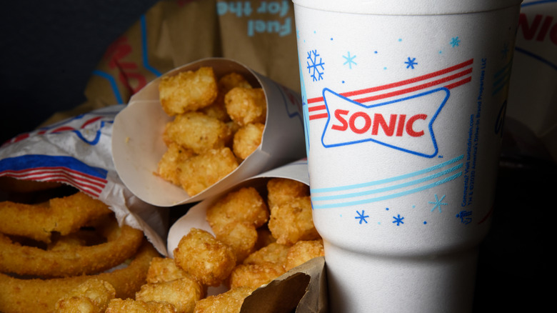 Sonic drink, onion rings, and tots