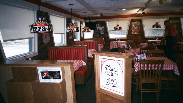 Pizza Hut retro interior with red booths