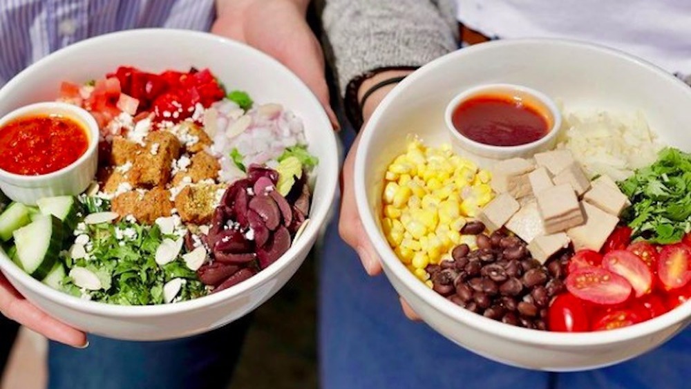 Bowls of salad from Freshii