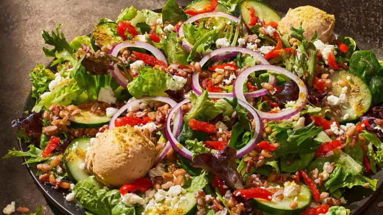 Salad bowl with grains onions