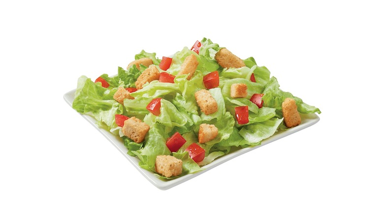 Salad with croutons on plate