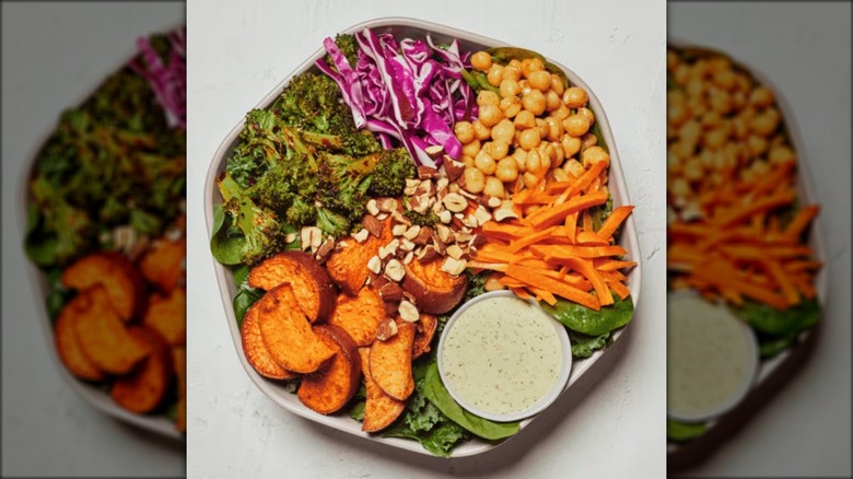 Bowl of vegetables and dressing