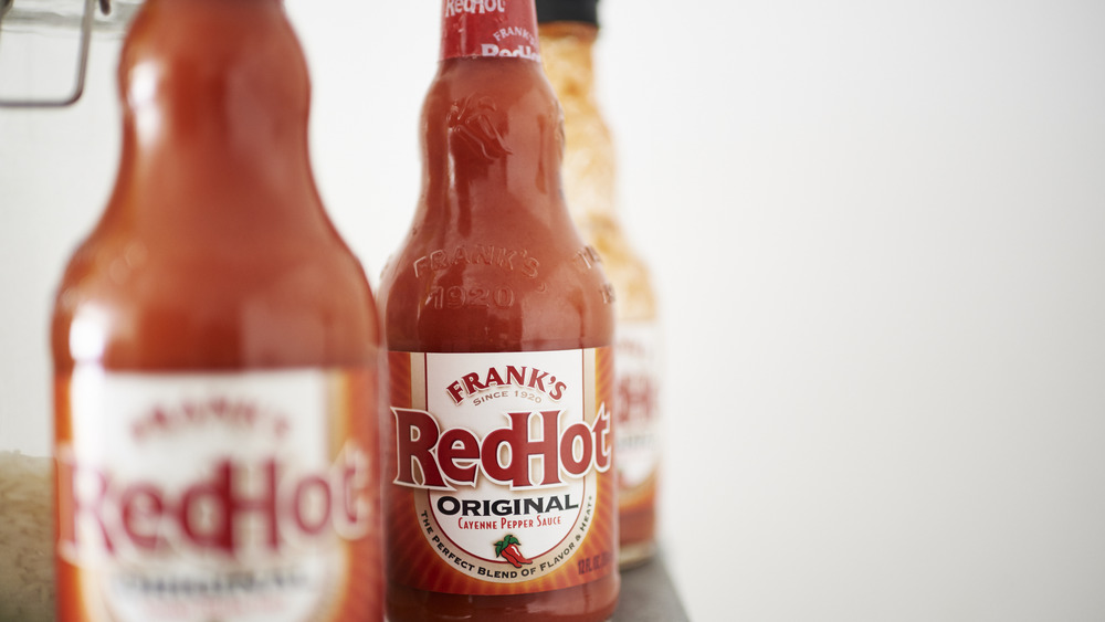 Frank's RedHot bottles lined up