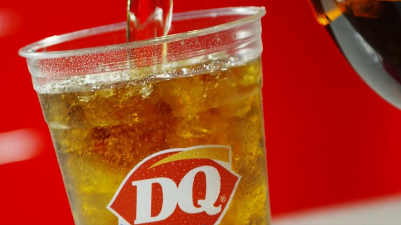 Sweet tea being poured into a DQ cup