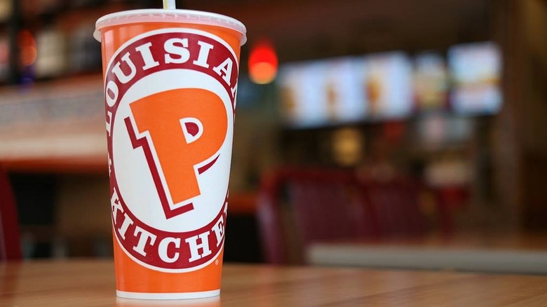 Popeyes cup with iced tea