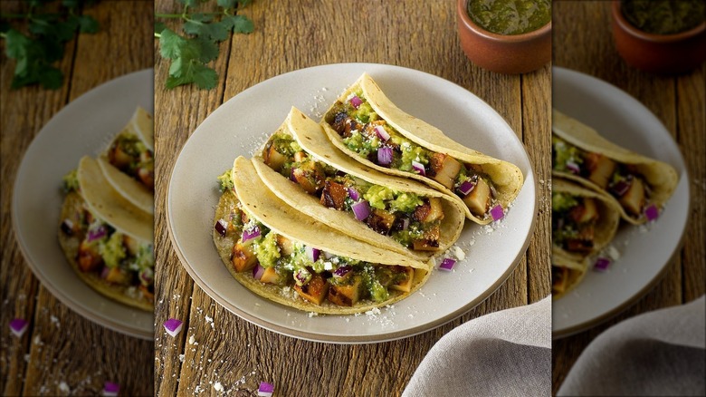 three qdoba tacos