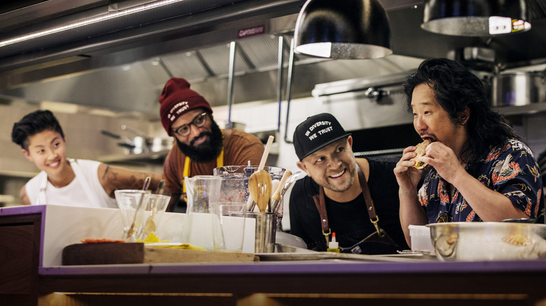 Justin Sutherland smiling on Fast Foodies set
