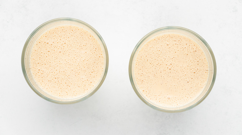 caramel apple milkshake in glasses