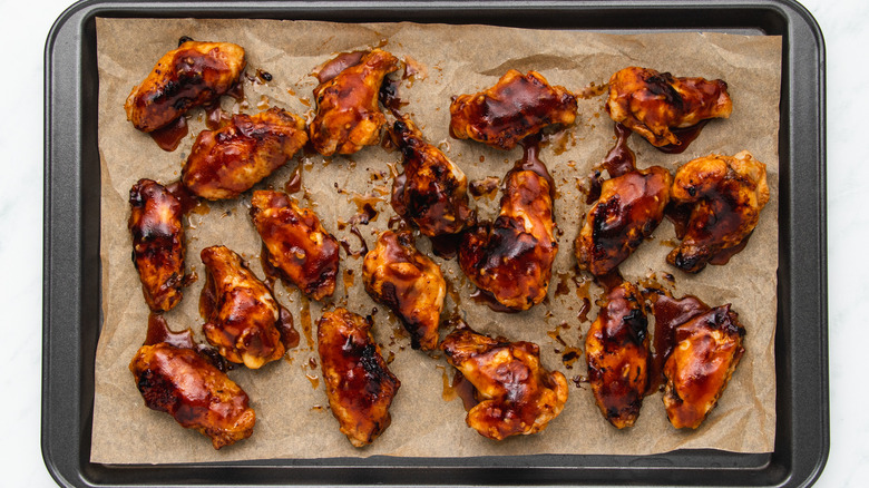 chicken wings on baking sheet