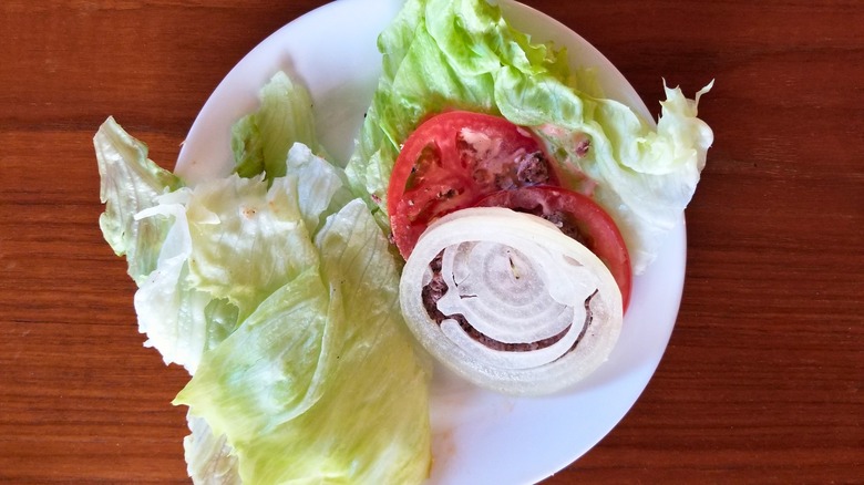 an open lettuce-wrapped In-N-Out burger