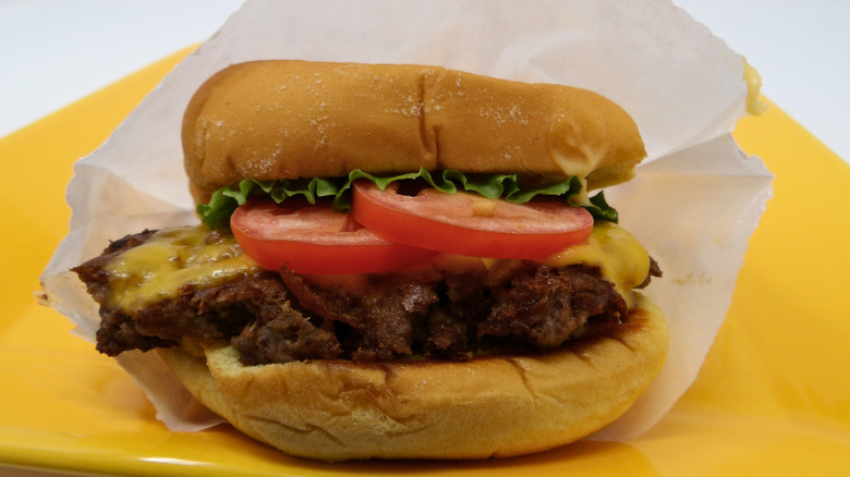 Shake Shack cheeseburger in wrapper