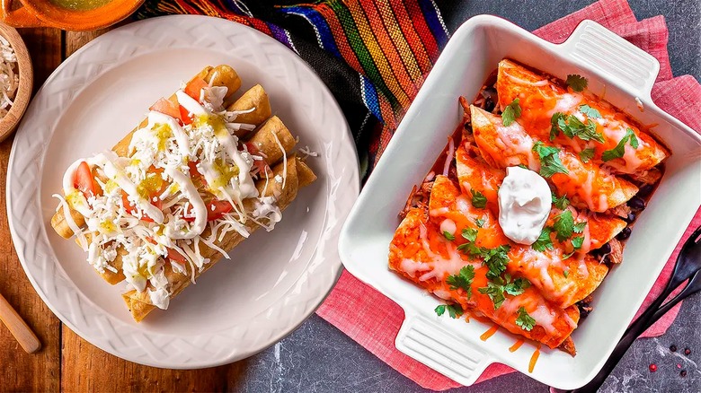 Enchiladas and flautas side by side on table