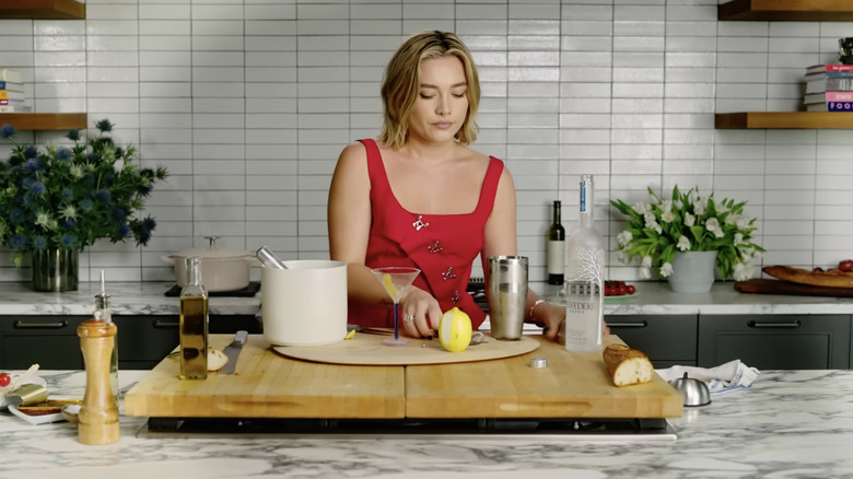 Florence Pugh making cocktail