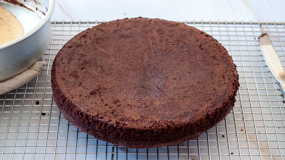 flourless chocolate cake cooling on rack