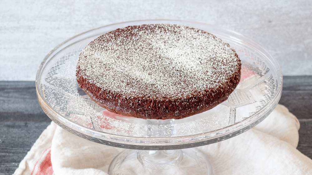 flourless chocolate cake on platter