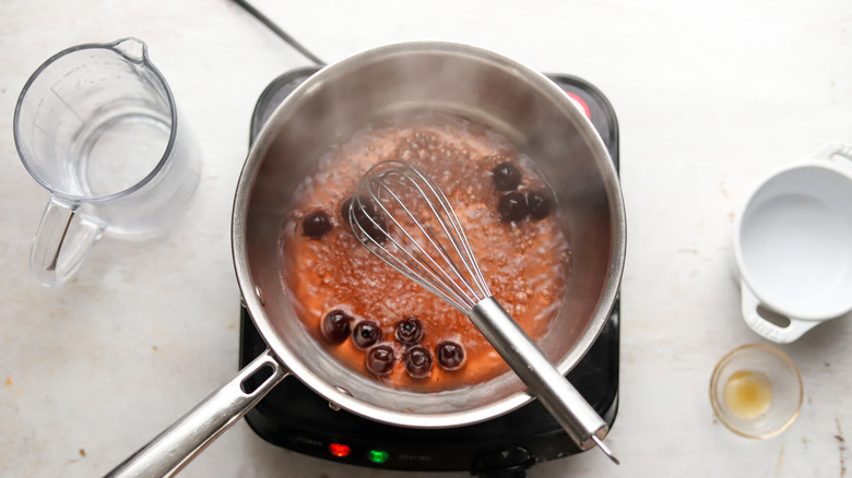 cherries boiling in syrup