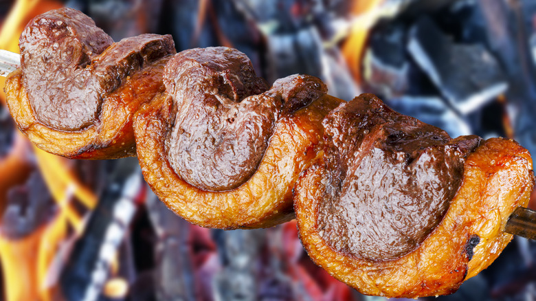 Picanha cooking on a spit 