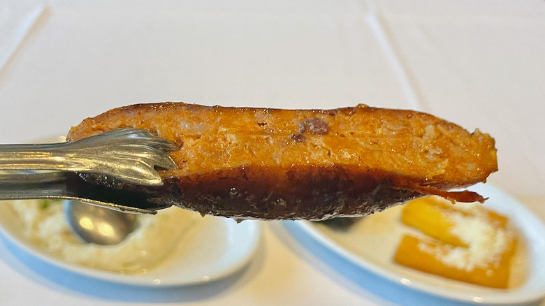 Slice of linguica sausage