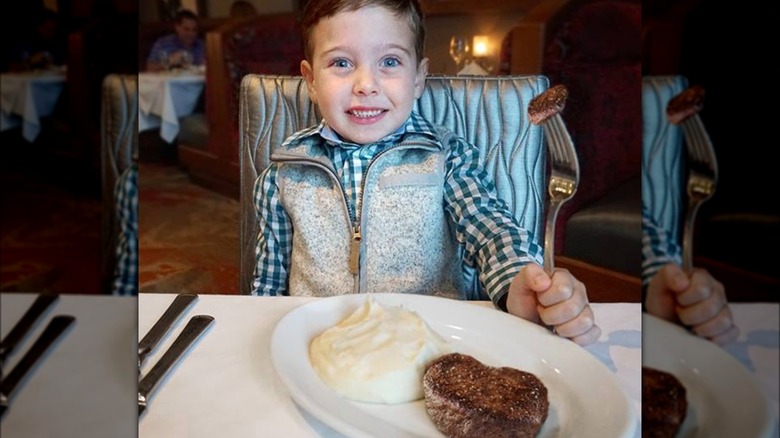 child eating at Ruth's Chris