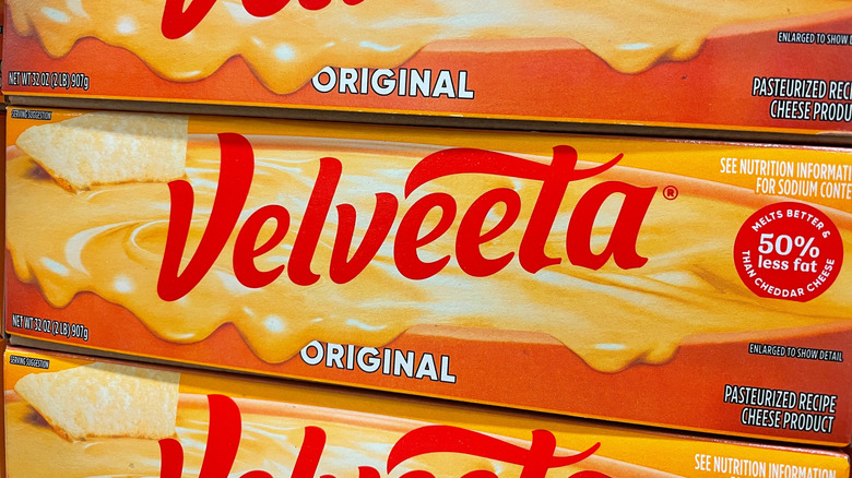 Three stacked blocks of Velveeta cheese