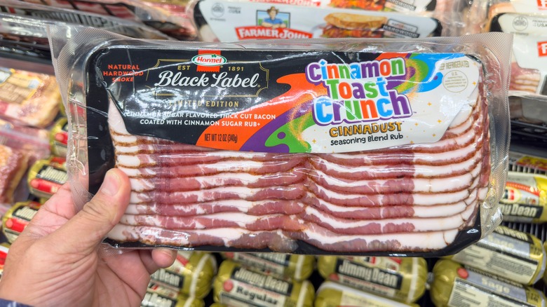 Hand holding package of Cinnamon Toast Crunch bacon