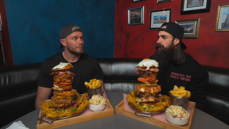 Adam Moran and James Smith doing Tap House Burger Challenge