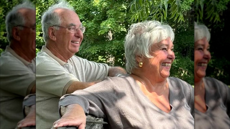 Nancy Fuller and husband David are smiling as they look off camera