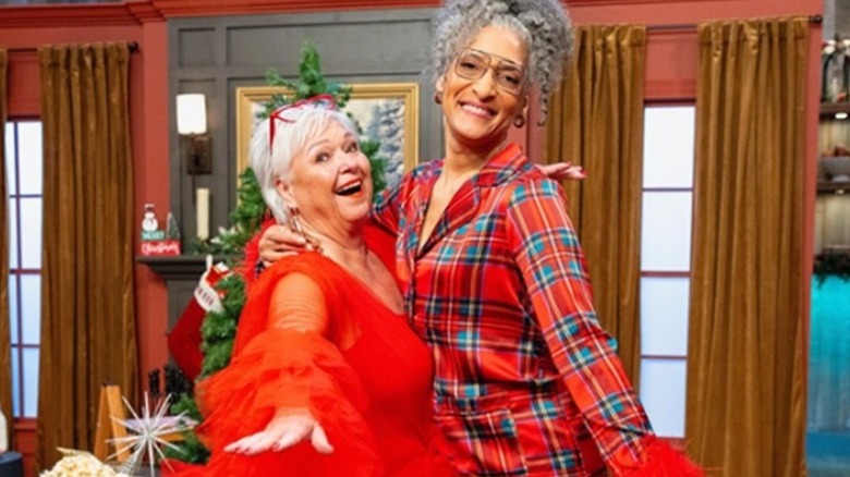 Nancy Fuller and Carla Hall pose on the set of the show