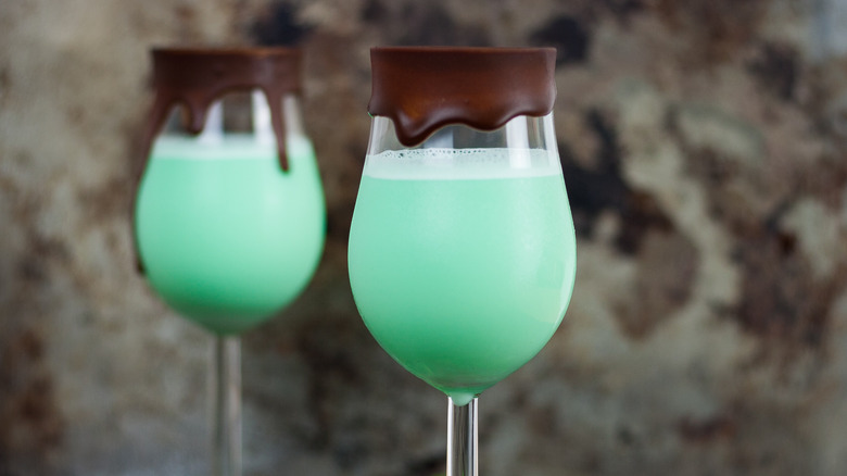 Grasshopper cocktails topped with chocolate rims