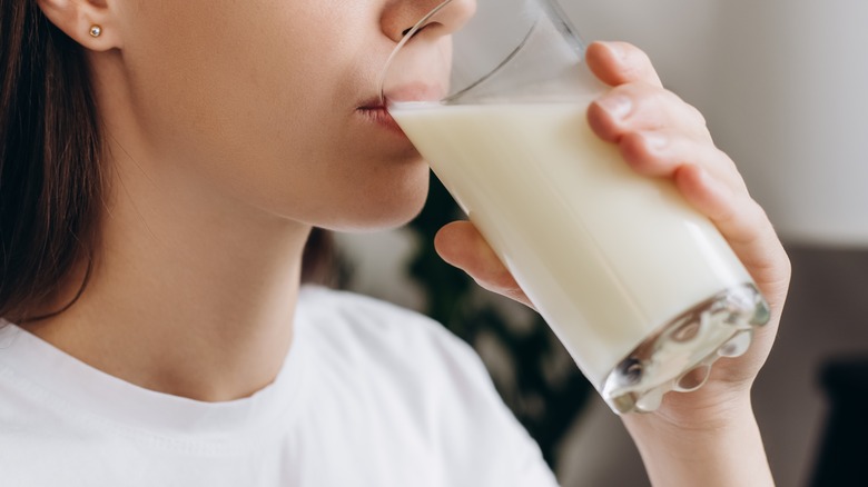 woman drinking glass of milk