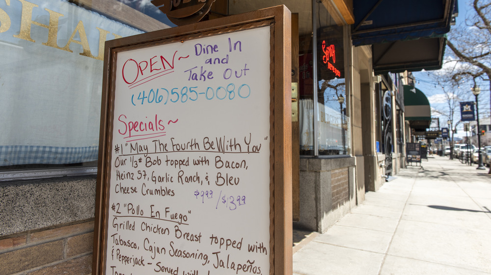 sidewalk sign showing restaurant specials