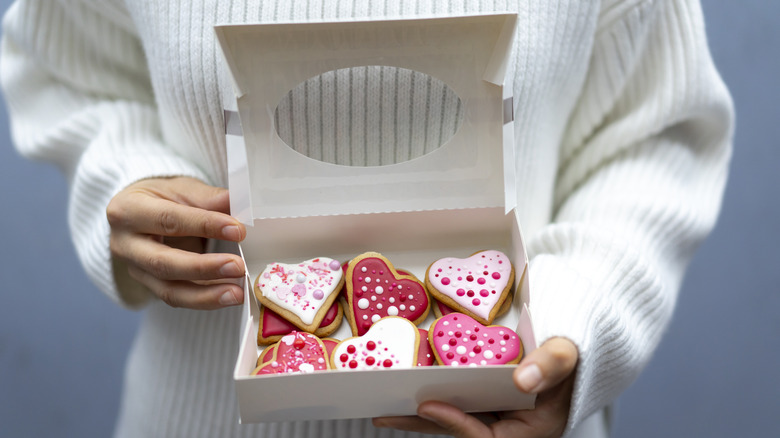 box of decorated heart cookies
