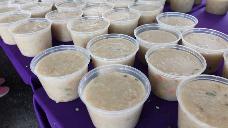 Cups of bubur lambuk on tray