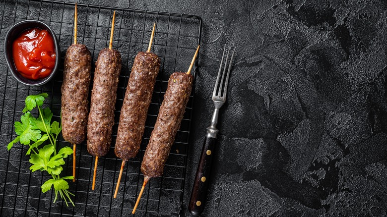 Four kebabs on skewers